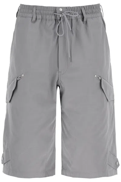 Y-3 Canvas Multi-pocket Bermuda Shorts. In Grey