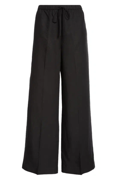 Totême Linen Drawstring Trousers In Black