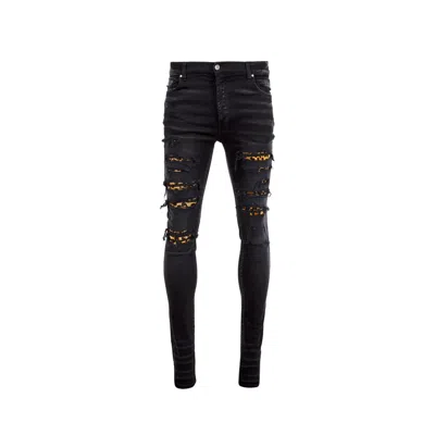 Amiri Leopard Denim Jeans In Black