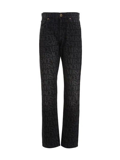 Versace Logo-print Straight-leg Jeans In Black