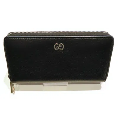 Gucci -- Black Leather Wallet  ()