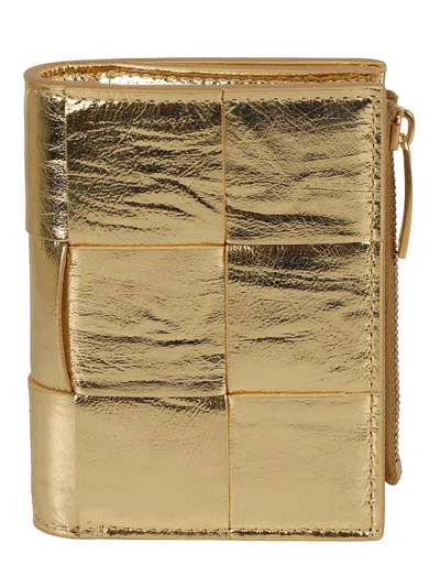 Bottega Veneta Cassette Small Bi-fold Zip Wallet In Gold-gold