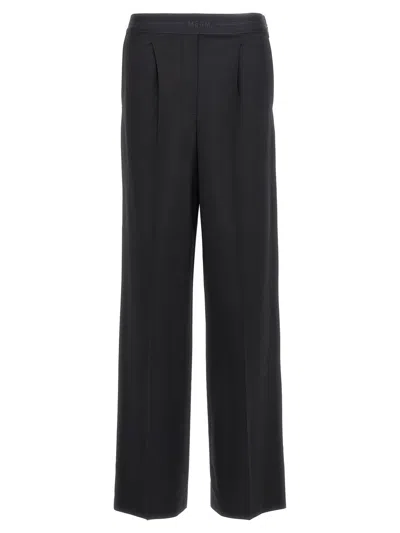 Msgm Logo Patch Wide Leg Trousers In Black 99