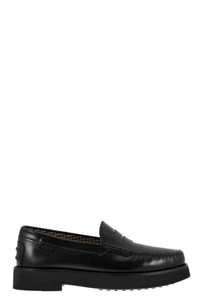 Tod's Leather Moccasin With Rubber Bottom In Black