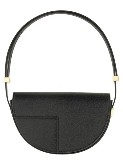 Patou Leather Handbag In Black