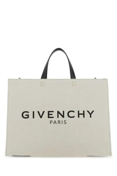 Givenchy Handbags. In Beige/black