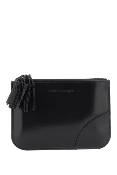 Comme Des Garçons Wallet Logo Embossed Wallet In Black