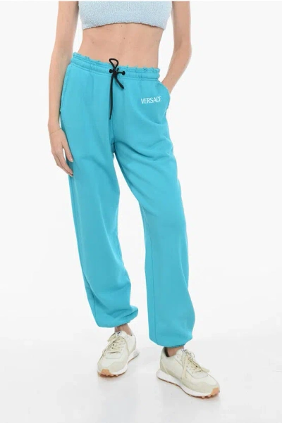 Versace Logo-print Track Trousers In Cyan