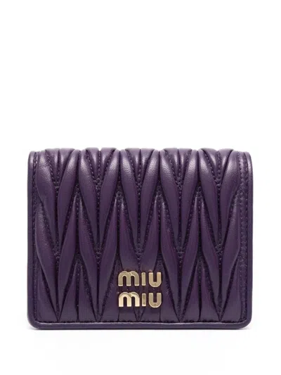 Miu Miu Logo-lettering Matelassé-effect Wallet In Viola