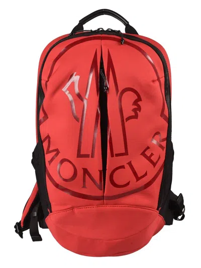 Moncler Logo Print Zipped Backpack In Red