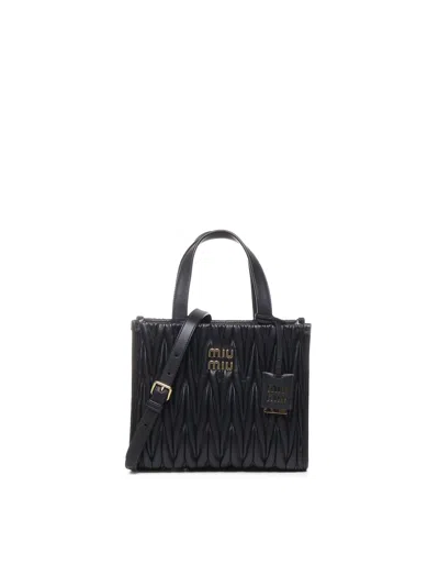 Miu Miu Logo Plaque Top Handle Tote Bag In Black