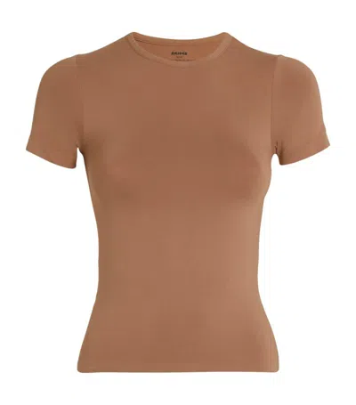 Skims Soft Smoothing T-shirt In Nude