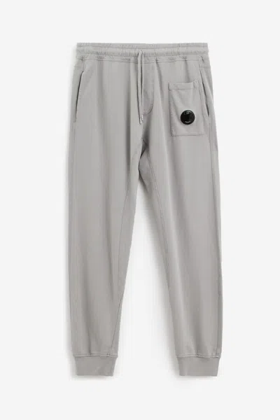 C.p. Company Trousers In Grey