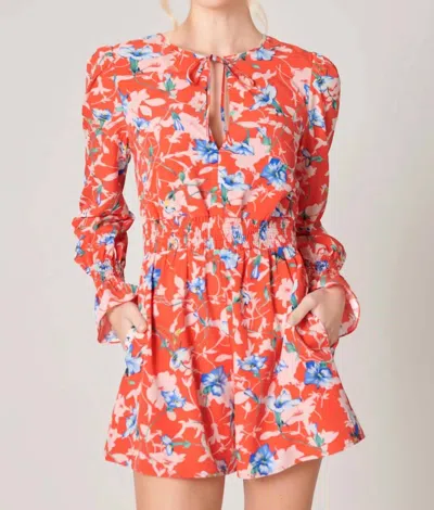 Sugarlips By The Bay Tropical Print Long Sleeve Romper In Red Multi Floral Print