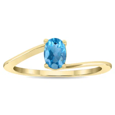 Sselects Women's Solitaire Oval Shaped Topaz Wave Ring In 10k Yellow Gold