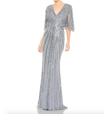 Mac Duggal Sequined V Neck Cape Sleeve Column Gown In Silver