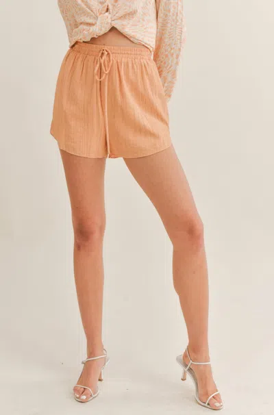 Sage The Label Clementine Crush Shorts In Tangerine In White