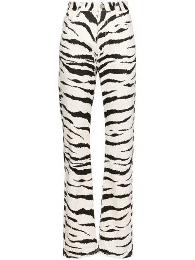 Alaïa Animalier Print Denim Jeans In Beige