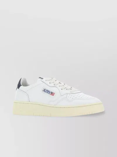 Autry Medalist Leather Sneaker In White And Black