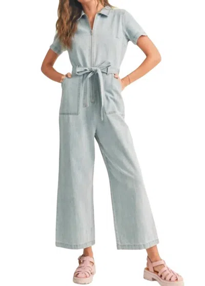 Miou Muse Denim Jumpsuit With Belt In Light Wash In Blue