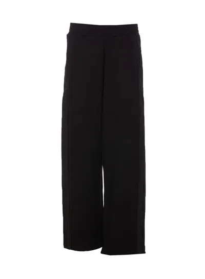 Hinnominate Trousers In Black