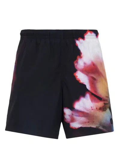 Alexander Mcqueen Solarized Floral Print Swim Shorts In Black