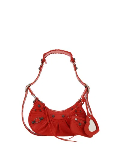 Balenciaga Handbags. In Red