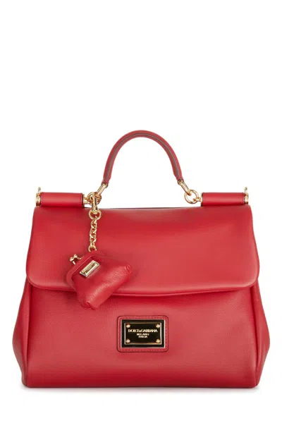 Dolce & Gabbana Handbags. In Red