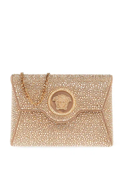 Versace Medusa Plaque Embellished Clutch Bag In Neutrals/gold