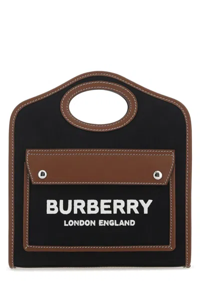 Burberry Two-tone Canvas And Leather Mini Pocket Handbag In Black/tan