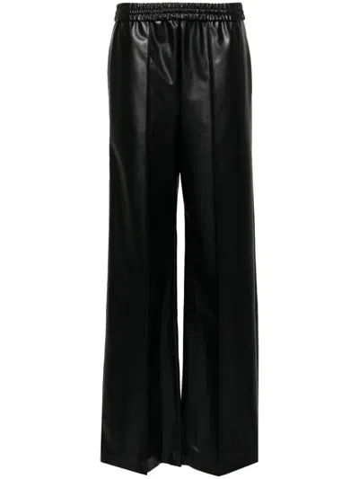 Wolford Elasticated Faux-leather Trousers In Black
