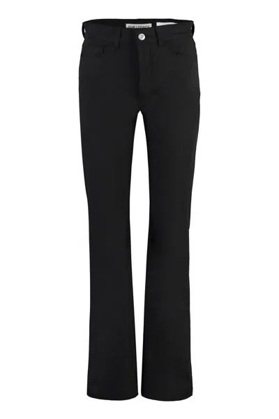 Our Legacy Flared Cotton Trousers In Black