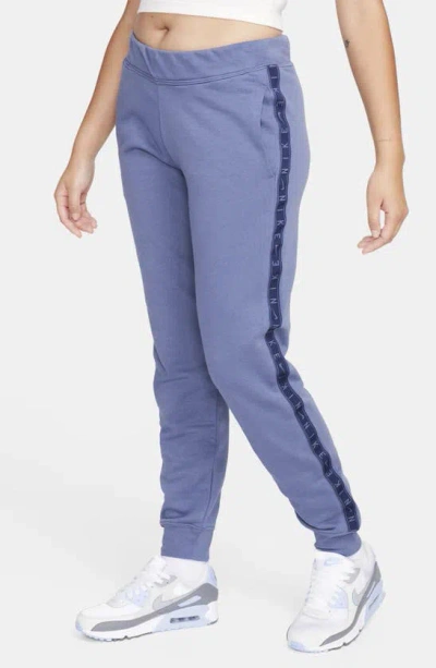 Nike Women's  Sportswear Essential Fleece Trousers In Blue