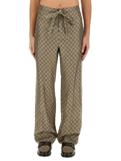 Gucci Gg Supreme Printed Pants In Beige