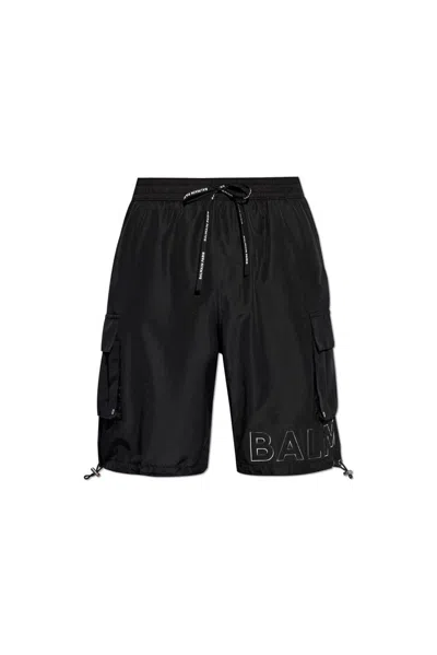 Balmain Logo Embellished Swim Shorts In Black