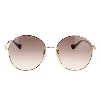 Gucci Eyewear Sunglasses In Gold