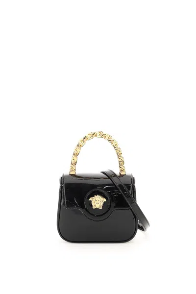 Versace La Medusa Embellished Patent-leather Shoulder Bag In Black+gold