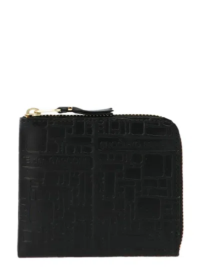 Comme Des Garçons 'embossed Logotype' Wallet In Black