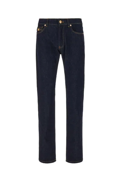 Versace Logo Patch Straight-leg Jeans In Black
