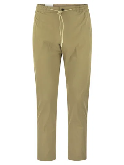 Pt01 Omega Trousers In Technical Fabric In Corda
