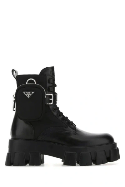 Prada Monolith Leather And Re-nylon Boots With Pouch In Black
