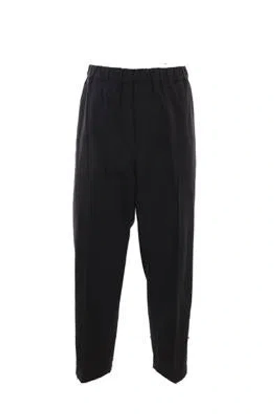 Jil Sander Elastic Waist Trousers In Black