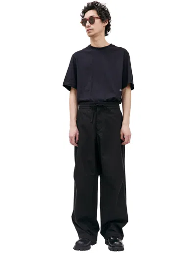 Oamc Cove Japanese Cotton Wide Trousers In Black