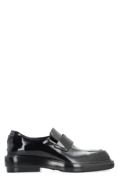 Prada Leather Loafers In Black