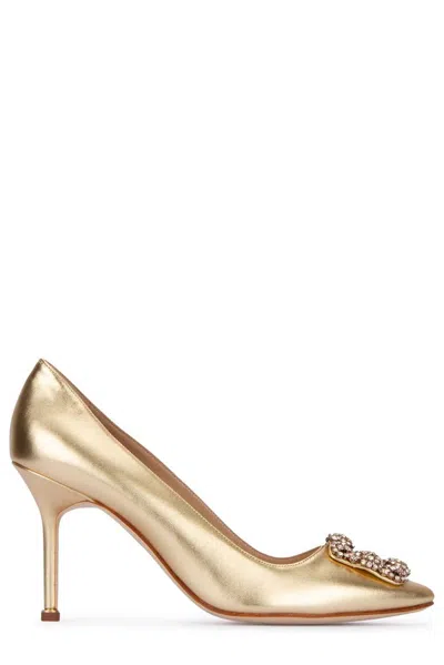 Manolo Blahnik Hangisi Buckle Embellished Pumps In Gold