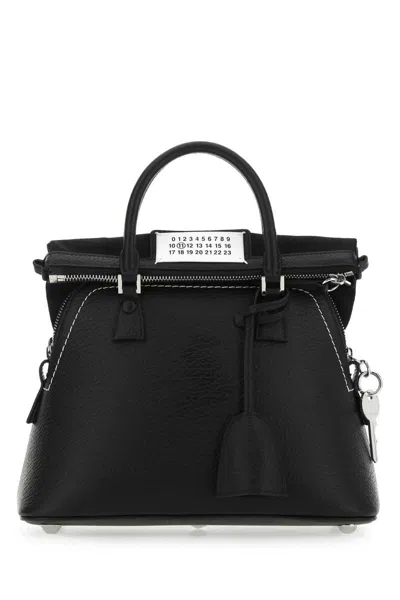 Maison Margiela Handbags. In Black
