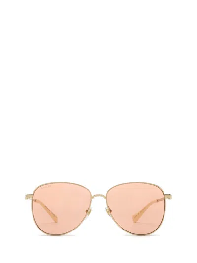 Gucci Gg Metal Alloy Round Sunglasses In Gold