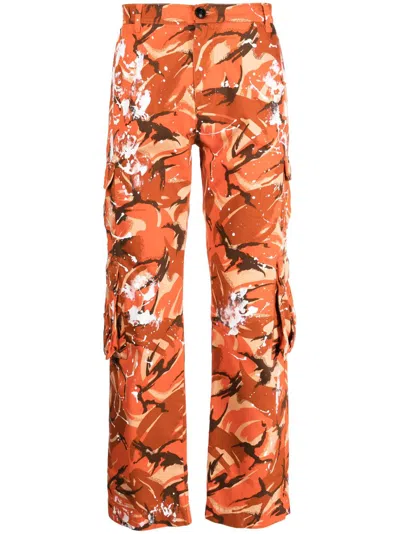 Martine Rose Paint Splatter Camouflage-print Trousers In Orange