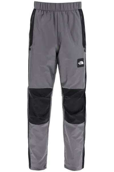 The North Face Nylon Ripstop Wind Shell Joggers In Grey