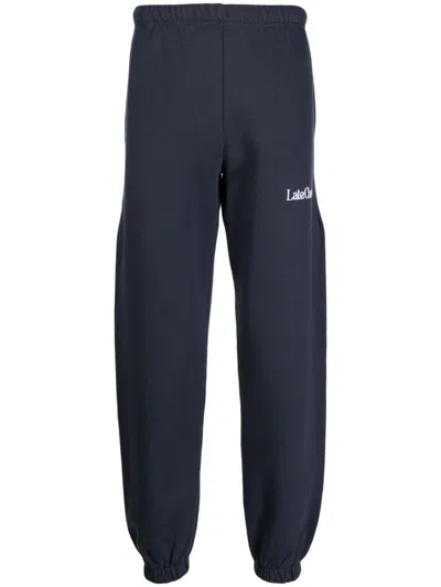 Late Checkout Logo-embroidered Cotton Track Pants In Blue